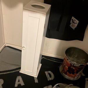 Toilet paper roll holder stander.
